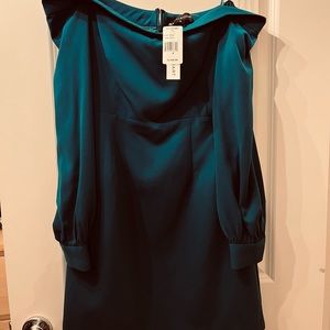 Jill Stuart long sleeved off shoulder lined cocktail dress.